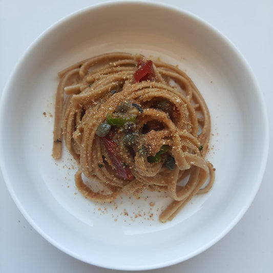 Stroncatura pomodori secchi, olive e capperi